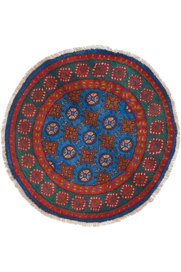 שטיח כפרי עגול מצמר בצבעים ירוק וכחול