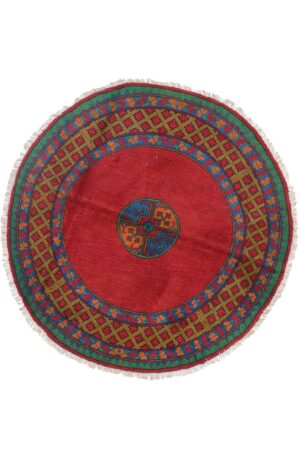 שטיח כפרי צמר עגול בעבודת יד בצבע אדום