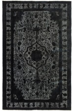 שטיח וינטג' טורקי מלבני אפור מצמר בסגנון פרחוני גאומטרי מתאים לחדר שינה